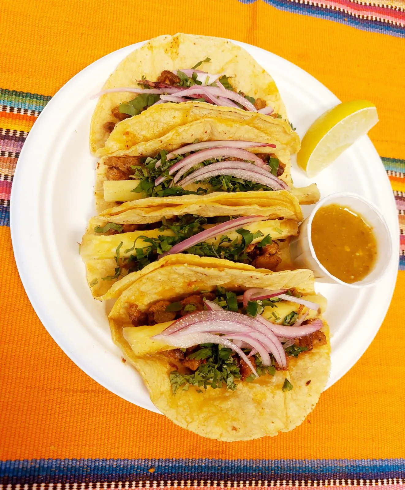 Tacos al pastor at PiKant&eacute; Edmonton - marinated pork with pineapple and cilantro